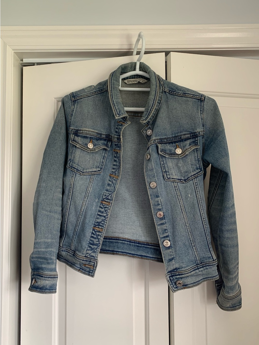 Zara light blue distressed denim jacket